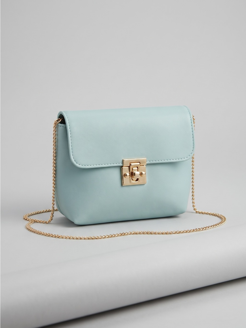 Light Blue Crossbody Chain Bag with Gold Hardware